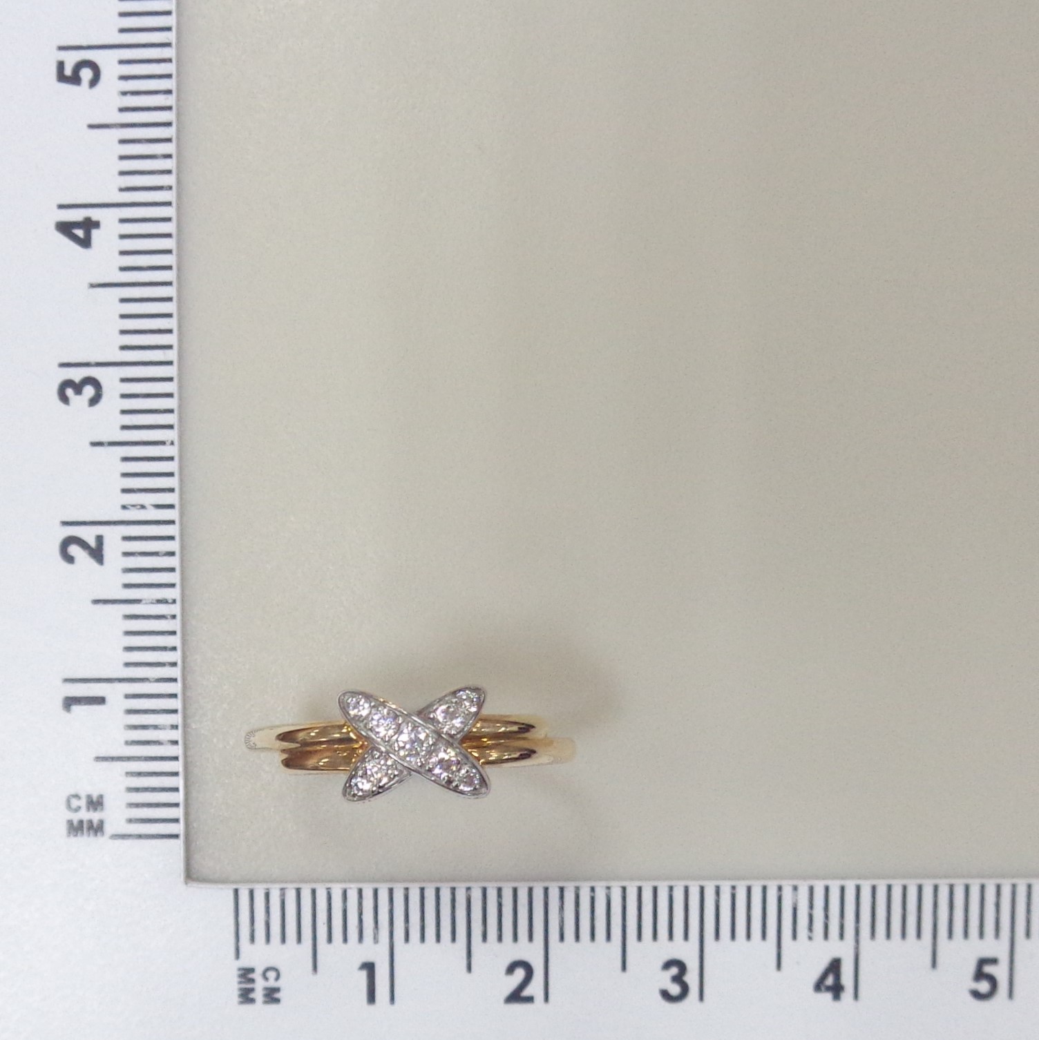 Золотое кольцо 585 пробы; родий; вставки 9 Фианит бесцв.;